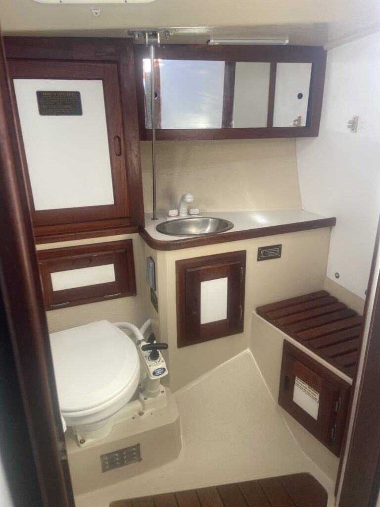 Cruise Oceanside waters on a classic Catalina sailboat. head