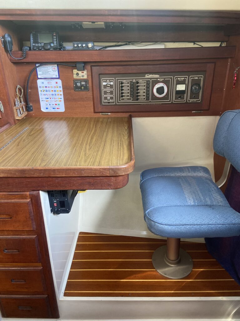 Cruise Oceanside waters on a classic Catalina sailboat. nav table