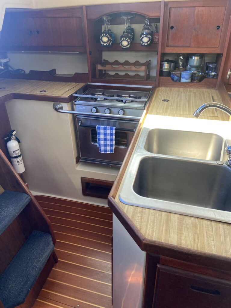 Cruise Oceanside waters on a classic Catalina sailboat. galley